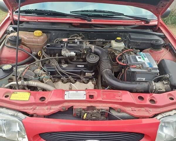 Красный Форд Фиеста, объемом двигателя 1.3 л и пробегом 34 тыс. км за 2700 $, фото 8 на Automoto.ua