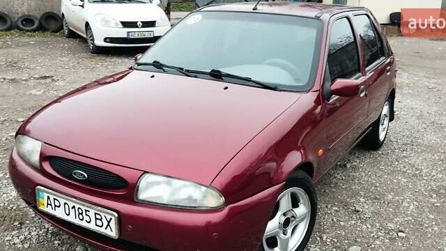 Красный Форд Фиеста, объемом двигателя 1.25 л и пробегом 260 тыс. км за 1550 $, фото 1 на Automoto.ua