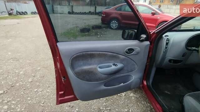 Красный Форд Фиеста, объемом двигателя 1.25 л и пробегом 260 тыс. км за 1550 $, фото 8 на Automoto.ua