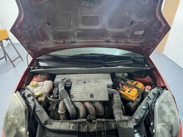 Червоний Форд Фієста, об'ємом двигуна 1.4 л та пробігом 214 тис. км за 3500 $, фото 13 на Automoto.ua