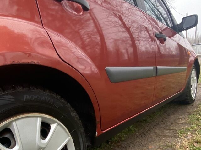 Червоний Форд Фієста, об'ємом двигуна 1.2 л та пробігом 226 тис. км за 3600 $, фото 9 на Automoto.ua