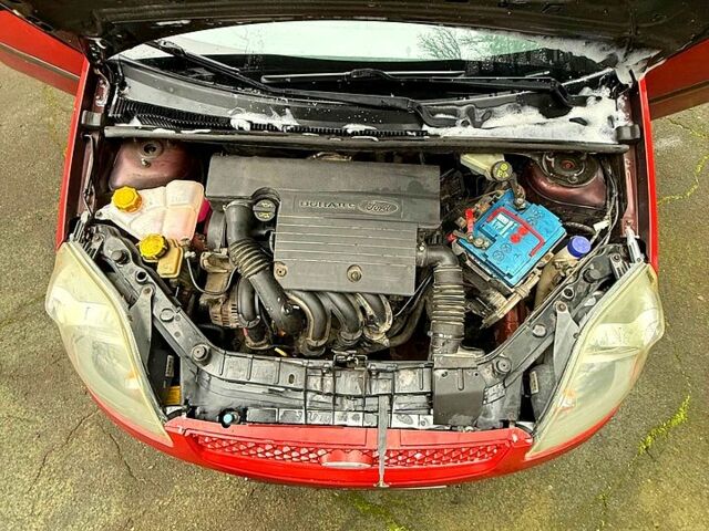 Червоний Форд Фієста, об'ємом двигуна 1.4 л та пробігом 199 тис. км за 4000 $, фото 8 на Automoto.ua