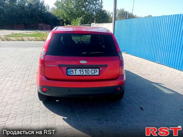 Красный Форд Фиеста, объемом двигателя 1.2 л и пробегом 210 тыс. км за 3700 $, фото 4 на Automoto.ua