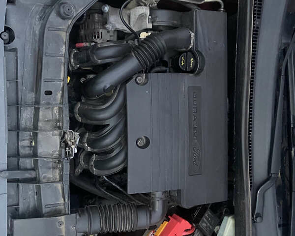 Форд Фиеста 2007 в Могилев-Подольском на Automoto.ua Красный Форд Фиеста, объемом двигателя 1.3 л и пробегом 204 тыс. км за 3700 $, фото 9 на Automoto.ua