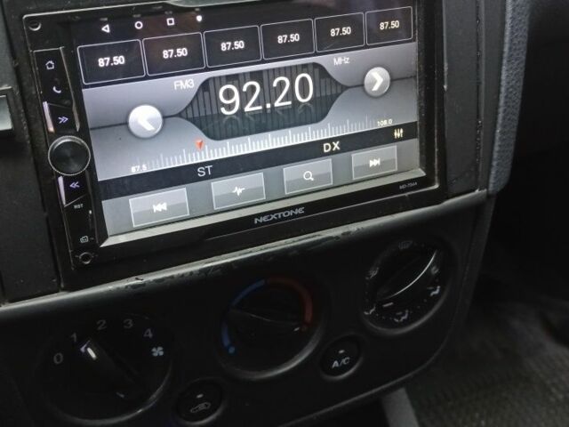 Красный Форд Фиеста, объемом двигателя 1.4 л и пробегом 195 тыс. км за 3500 $, фото 18 на Automoto.ua