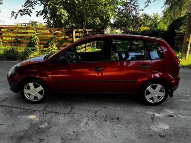 Червоний Форд Фієста, об'ємом двигуна 1.4 л та пробігом 183 тис. км за 3940 $, фото 10 на Automoto.ua