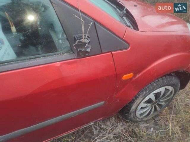 Красный Форд Фиеста, объемом двигателя 1.4 л и пробегом 175 тыс. км за 1750 $, фото 12 на Automoto.ua