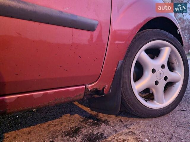 Красный Форд Фиеста, объемом двигателя 1.39 л и пробегом 255 тыс. км за 3250 $, фото 9 на Automoto.ua