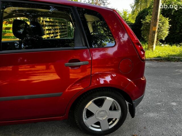 Червоний Форд Фієста, об'ємом двигуна 1.4 л та пробігом 183 тис. км за 4990 $, фото 11 на Automoto.ua