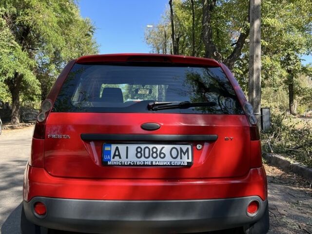 Червоний Форд Фієста, об'ємом двигуна 1.2 л та пробігом 230 тис. км за 3000 $, фото 11 на Automoto.ua