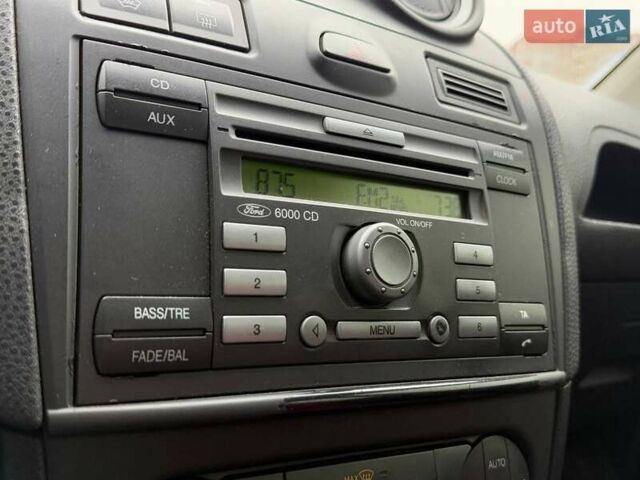 Красный Форд Фиеста, объемом двигателя 1.4 л и пробегом 213 тыс. км за 3190 $, фото 19 на Automoto.ua