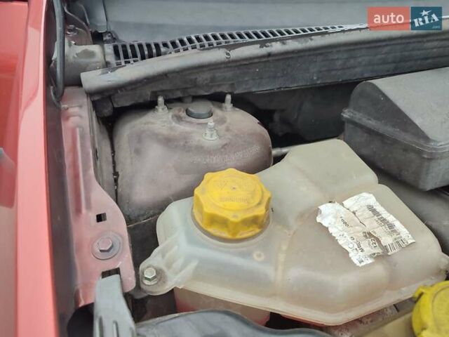 Красный Форд Фиеста, объемом двигателя 1.4 л и пробегом 170 тыс. км за 4100 $, фото 32 на Automoto.ua