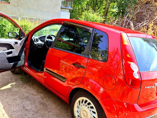 Красный Форд Фиеста, объемом двигателя 1.4 л и пробегом 232 тыс. км за 4000 $, фото 8 на Automoto.ua