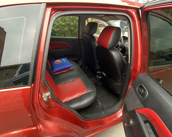 Красный Форд Фиеста, объемом двигателя 1.4 л и пробегом 165 тыс. км за 3900 $, фото 4 на Automoto.ua