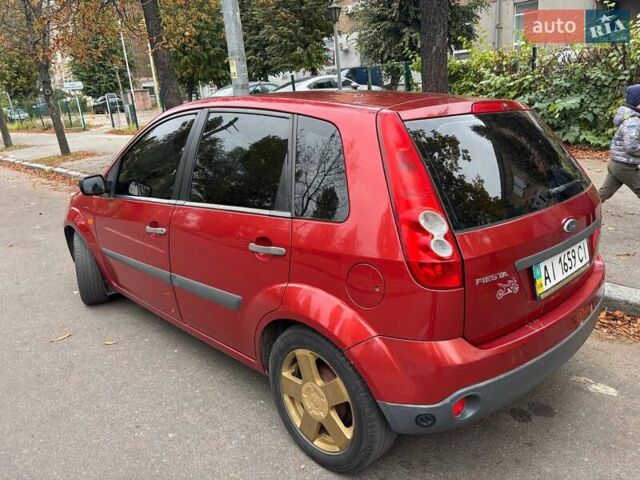 Красный Форд Фиеста, объемом двигателя 1.4 л и пробегом 273 тыс. км за 3800 $, фото 12 на Automoto.ua