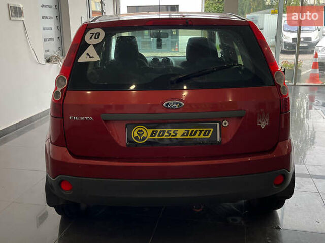 Червоний Форд Фієста, об'ємом двигуна 1.24 л та пробігом 164 тис. км за 4150 $, фото 5 на Automoto.ua
