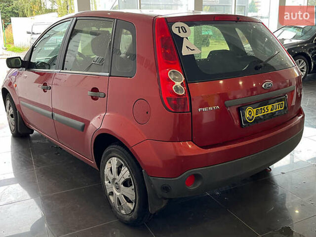 Червоний Форд Фієста, об'ємом двигуна 1.24 л та пробігом 164 тис. км за 4150 $, фото 4 на Automoto.ua