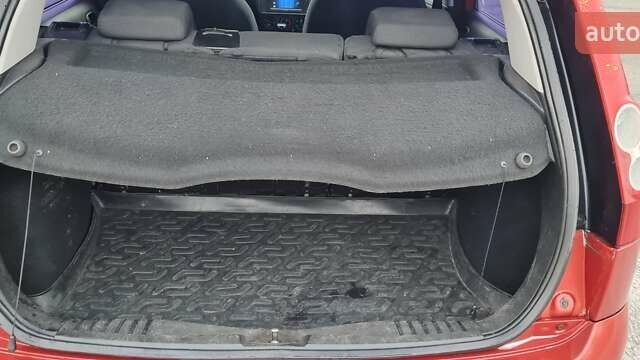 Красный Форд Фиеста, объемом двигателя 1.4 л и пробегом 205 тыс. км за 4300 $, фото 13 на Automoto.ua