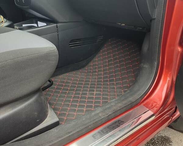 Красный Форд Фиеста, объемом двигателя 1.4 л и пробегом 170 тыс. км за 4100 $, фото 26 на Automoto.ua