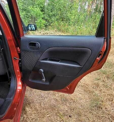 Красный Форд Фиеста, объемом двигателя 1.39 л и пробегом 136 тыс. км за 4400 $, фото 2 на Automoto.ua