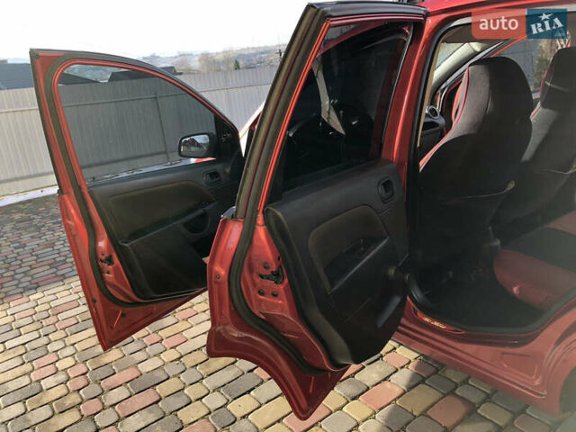 Червоний Форд Фієста, об'ємом двигуна 1.25 л та пробігом 140 тис. км за 2999 $, фото 12 на Automoto.ua