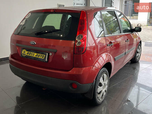 Червоний Форд Фієста, об'ємом двигуна 1.24 л та пробігом 164 тис. км за 4150 $, фото 6 на Automoto.ua
