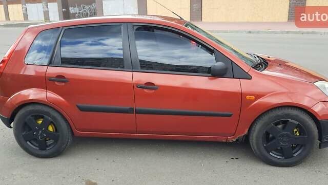 Червоний Форд Фієста, об'ємом двигуна 1.4 л та пробігом 149 тис. км за 3200 $, фото 13 на Automoto.ua