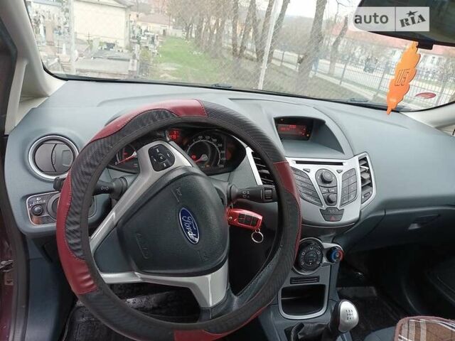 Червоний Форд Фієста, об'ємом двигуна 1.2 л та пробігом 220 тис. км за 5100 $, фото 13 на Automoto.ua