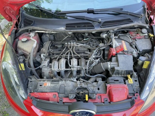 Червоний Форд Фієста, об'ємом двигуна 0.12 л та пробігом 176 тис. км за 5500 $, фото 7 на Automoto.ua