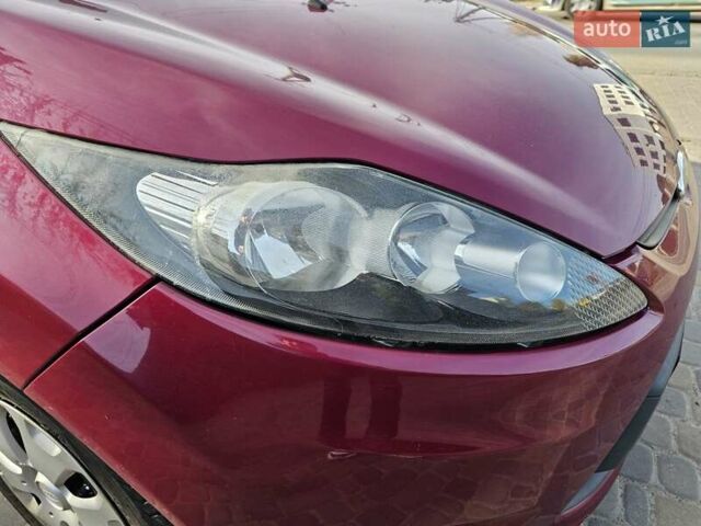 Красный Форд Фиеста, объемом двигателя 1.4 л и пробегом 136 тыс. км за 6300 $, фото 24 на Automoto.ua