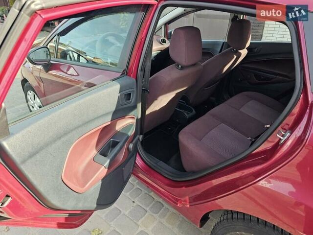 Красный Форд Фиеста, объемом двигателя 1.4 л и пробегом 136 тыс. км за 6300 $, фото 7 на Automoto.ua
