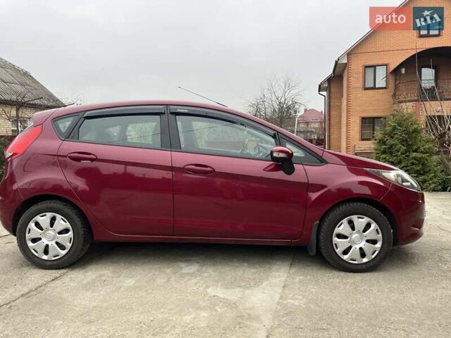 Червоний Форд Фієста, об'ємом двигуна 1.39 л та пробігом 136 тис. км за 6350 $, фото 4 на Automoto.ua