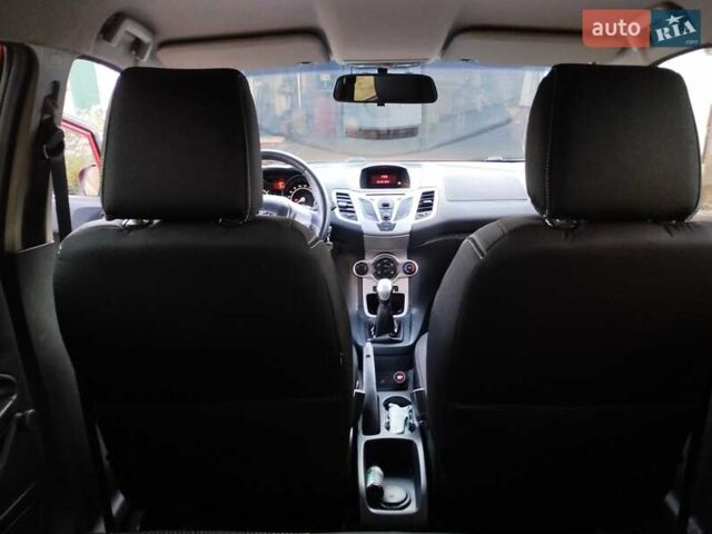 Красный Форд Фиеста, объемом двигателя 1.25 л и пробегом 61 тыс. км за 6000 $, фото 1 на Automoto.ua