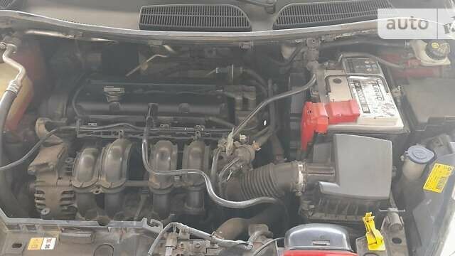 Красный Форд Фиеста, объемом двигателя 1.39 л и пробегом 240 тыс. км за 4000 $, фото 13 на Automoto.ua