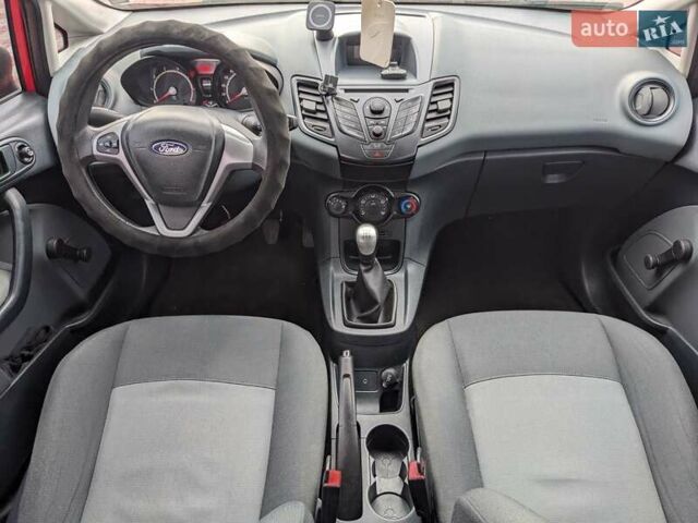 Форд Фиеста 2011 в Белой Церкве на Automoto.ua Красный Форд Фиеста, объемом двигателя 1.2 л и пробегом 239 тыс. км за 5400 $, фото 32 на Automoto.ua
