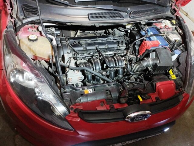 Червоний Форд Фієста, об'ємом двигуна 1.25 л та пробігом 62 тис. км за 6300 $, фото 4 на Automoto.ua