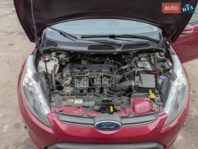 Червоний Форд Фієста, об'ємом двигуна 1.4 л та пробігом 134 тис. км за 5750 $, фото 6 на Automoto.ua