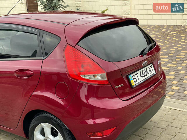 Красный Форд Фиеста, объемом двигателя 1.4 л и пробегом 65 тыс. км за 8300 $, фото 22 на Automoto.ua