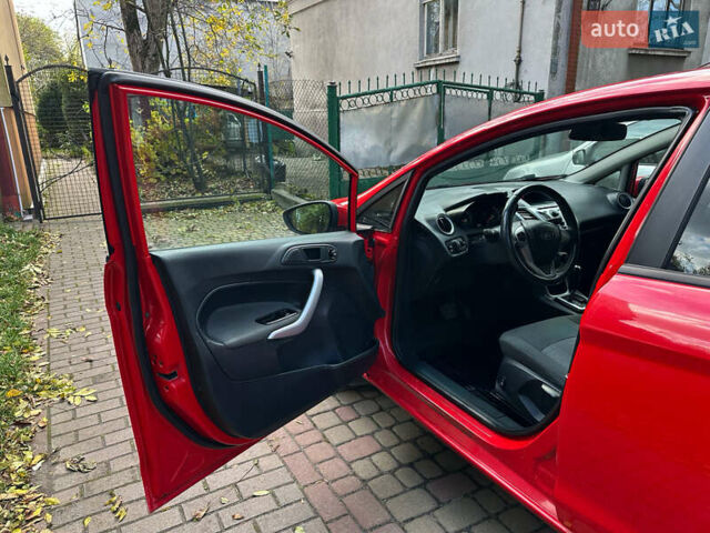 Форд Фиеста 2011 в Львове на Automoto.ua Красный Форд Фиеста, объемом двигателя 1.39 л и пробегом 118 тыс. км за 6800 $, фото 9 на Automoto.ua