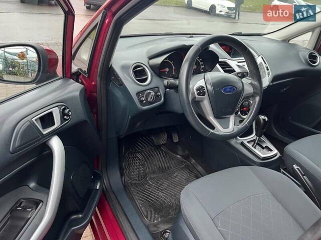 Красный Форд Фиеста, объемом двигателя 1.4 л и пробегом 168 тыс. км за 6700 $, фото 14 на Automoto.ua