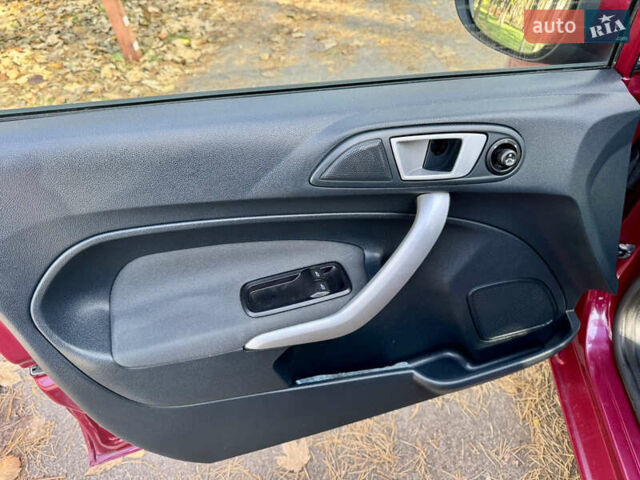 Форд Фиеста 2011 в Киеве на Automoto.ua Красный Форд Фиеста, объемом двигателя 1.4 л и пробегом 157 тыс. км за 6600 $, фото 9 на Automoto.ua