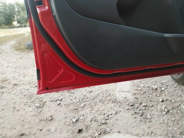 Червоний Форд Фієста, об'ємом двигуна 1.25 л та пробігом 62 тис. км за 6300 $, фото 6 на Automoto.ua