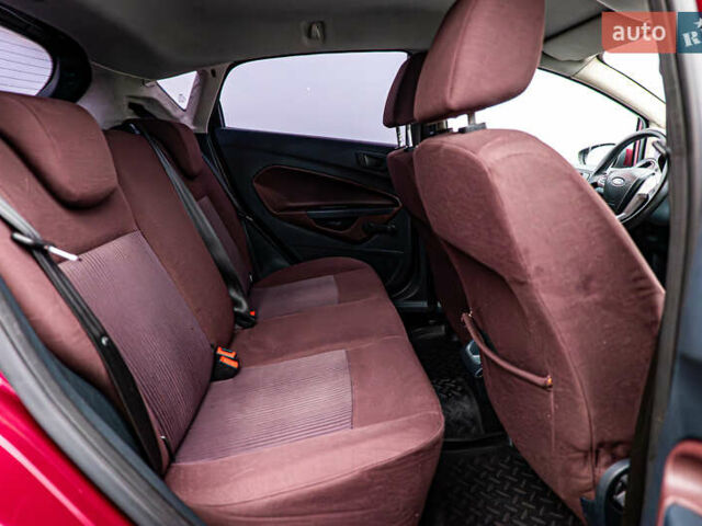 Красный Форд Фиеста, объемом двигателя 1.2 л и пробегом 186 тыс. км за 5664 $, фото 16 на Automoto.ua