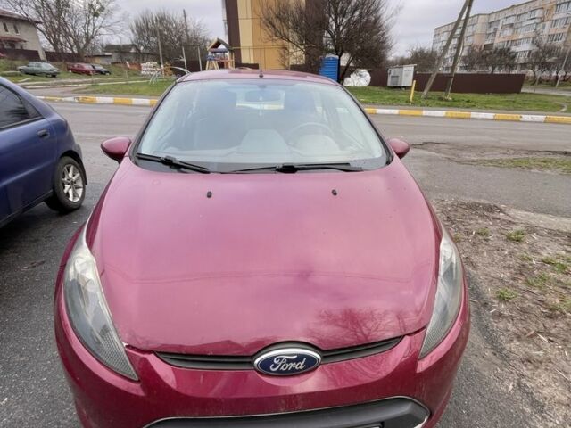 Червоний Форд Фієста, об'ємом двигуна 1.2 л та пробігом 218 тис. км за 6000 $, фото 1 на Automoto.ua