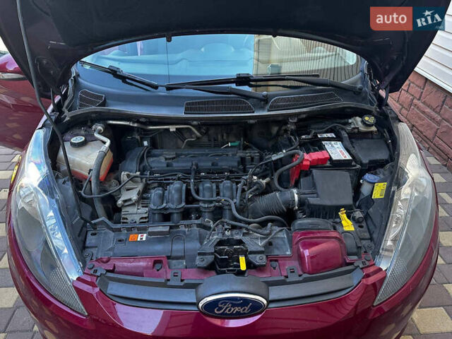 Форд Фиеста 2011 в Кременчуге на Automoto.ua Красный Форд Фиеста, объемом двигателя 1.4 л и пробегом 114 тыс. км за 7800 $, фото 7 на Automoto.ua