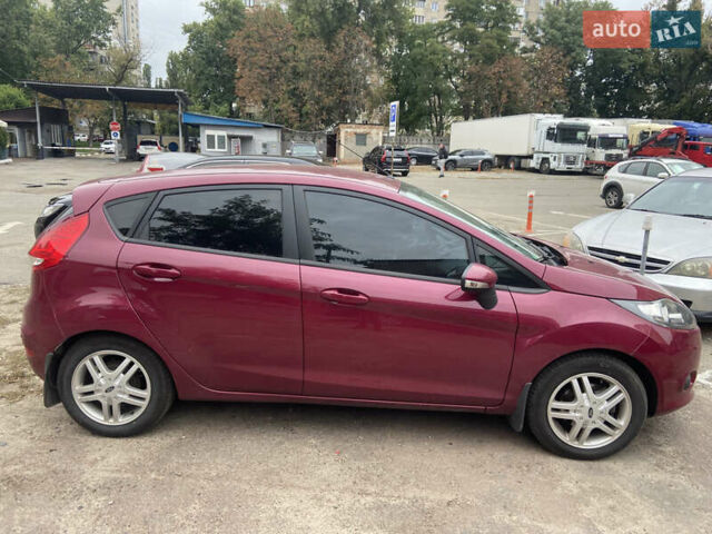 Червоний Форд Фієста, об'ємом двигуна 1.39 л та пробігом 94 тис. км за 7800 $, фото 19 на Automoto.ua