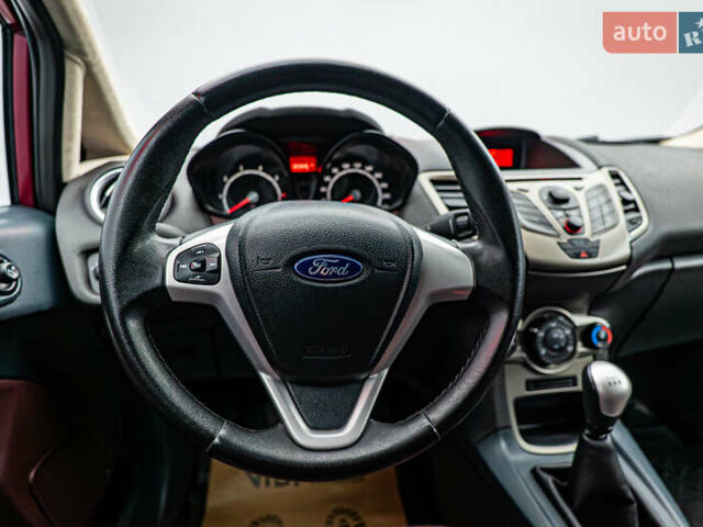 Красный Форд Фиеста, объемом двигателя 1.2 л и пробегом 186 тыс. км за 5664 $, фото 11 на Automoto.ua