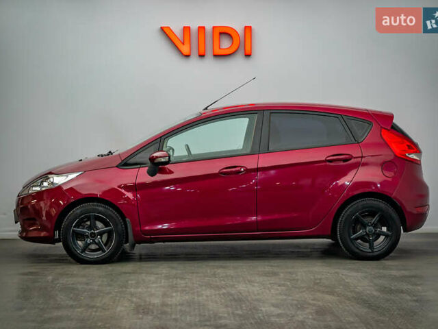 Красный Форд Фиеста, объемом двигателя 1.2 л и пробегом 186 тыс. км за 5664 $, фото 2 на Automoto.ua
