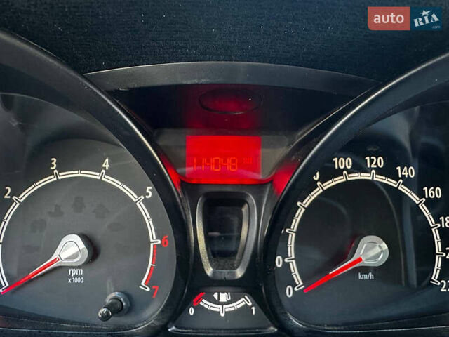 Форд Фиеста 2011 в Кременчуге на Automoto.ua Красный Форд Фиеста, объемом двигателя 1.4 л и пробегом 114 тыс. км за 7800 $, фото 11 на Automoto.ua