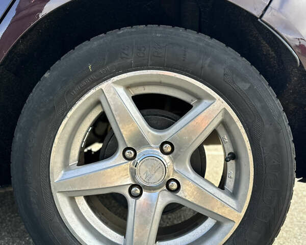 Форд Фієста 2011 у Києві на Automoto.ua Червоний Форд Фієста, об'ємом двигуна 1.24 л та пробігом 170 тис. км за 5500 $, фото 11 на Automoto.ua